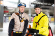 Courier Delivery Men With Bicycles Using Digital Tablet