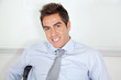 Young Businessman Relaxing In Office