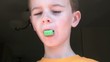 Boy Chewing Gum & Smiling