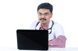 Photo: Indian young doctor with laptop Indian young doctor with laptop