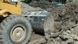 Bulldozer Wheels Spinning Pushing Dirt