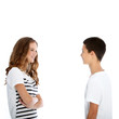 Teenage boy and girl chatting