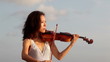 Video: Violinist playing on violin while sunset Violinist playing on violin while sunset