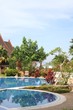 Photo: Tropical resort with swimming pool Tropical resort with swimming pool