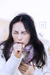 Bad cough by woman in winter