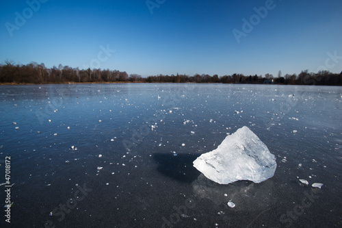 Photo: Freezing winter temperatures: block of ice lying on the surface Freezing winter temperatures: block of ice lying on the surface
