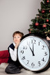 Happy boy hugs Christmas gift