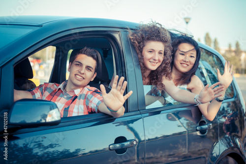 Photo: Boys and Girls in a Car Leaving for Vacation Boys and Girls in a Car Leaving for Vacation