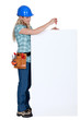 craftswoman fixing an ad board