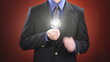 Man Holding Light Bulb