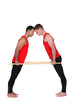 Gymnasts standing head to head