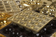 empty golden boxes of chocolates shapes background