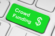 Green crowd funding button on keyboard
