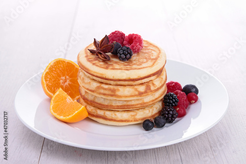 Photo: pancakes with berries fruits pancakes with berries fruits