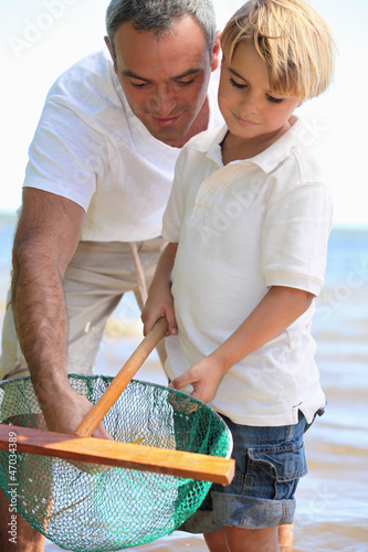 Photo: Father and son fishing Father and son fishing
