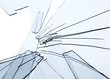 Broken glass fragments above white