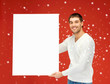 handsome man with big blank board