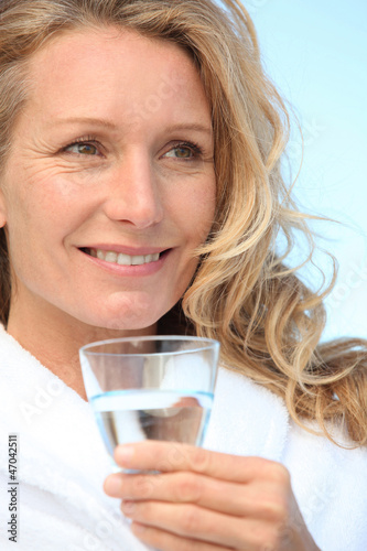 Photo: Woman with a glass of water Woman with a glass of water