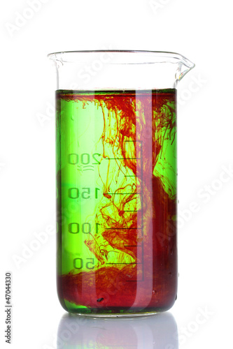 Photo: brightly ink in a flask with water isolated on white brightly ink in a flask with water isolated on white