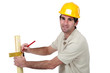Man marking timber