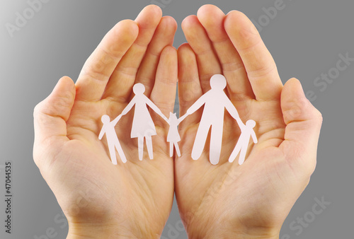 Photo: Paper family in hands Paper family in hands