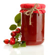 jar with hip roses jam and ripe berries, isolated on white