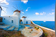 Panoramic view of two windmills and their bases Mykonos Greece C Panoramic view of two windmills and their bases Mykonos Greece C
