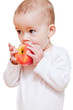 Baby girl eating healthy food isolated