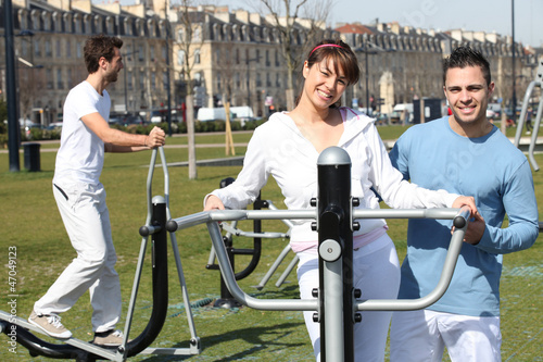 Photo: People exercising in a public park People exercising in a public park