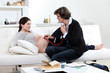 Foto: Doctor with a pregnant woman Doctor with a pregnant woman