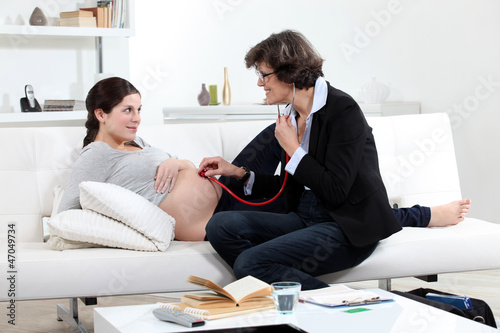 Photo: Doctor with a pregnant woman Doctor with a pregnant woman