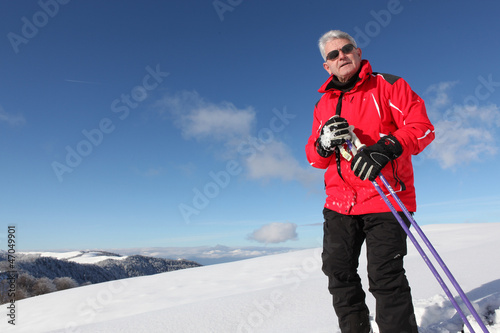 Photo: senior skiing senior skiing