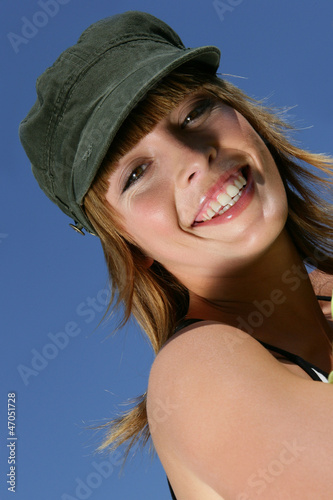 Photo: Woman wearing a hat outdoors Woman wearing a hat outdoors