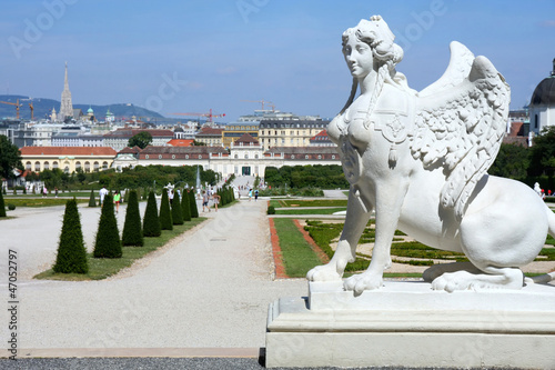 Photo: Sphinx statue and Belvedere garden in Vienna, Austria Sphinx statue and Belvedere garden in Vienna, Austria