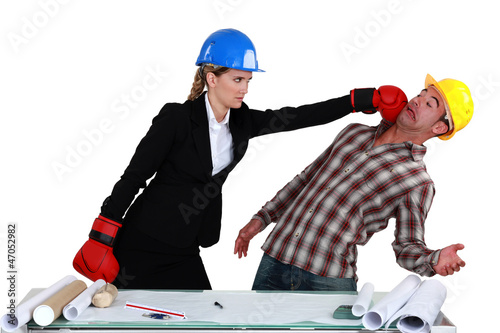 Photo: Co-workers fighting Co-workers fighting