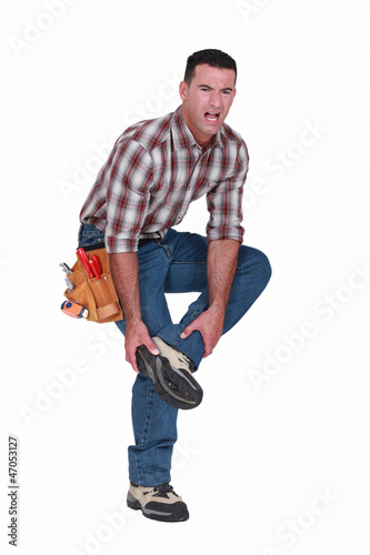 Photo: Builder with foot injury Builder with foot injury