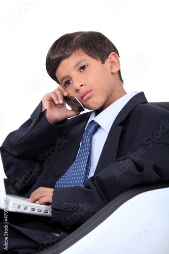 Photo: Little boy dressed as businessman Little boy dressed as businessman