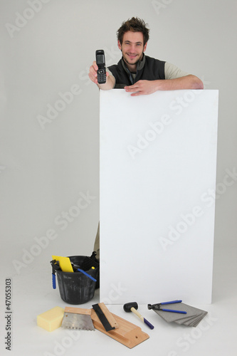 Photo: Tiler promoting his services Tiler promoting his services