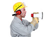 Manual worker shouting into megaphone