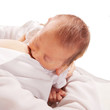 Mother breastfeeding newborn tiny baby.
