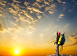Man on top of mountain.