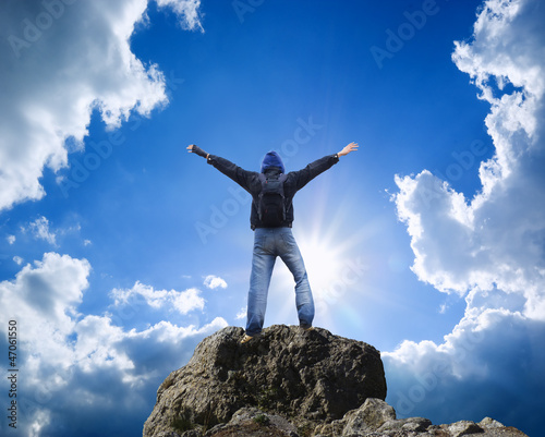 Photo: Man on top of mountain. Man on top of mountain.