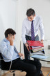Businessmen Overwhelmed By Load Of Work