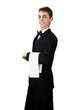 young waiter in work uniformon the white