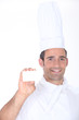 Chef with a blank business card