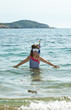 portrait of little girl in the sea