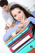 Oblique image of students with folders