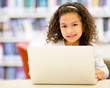 Little girl using  a computer