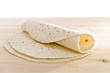 Pita bread on kitchen wooden plank