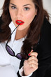 Woman with sunglasses in hand